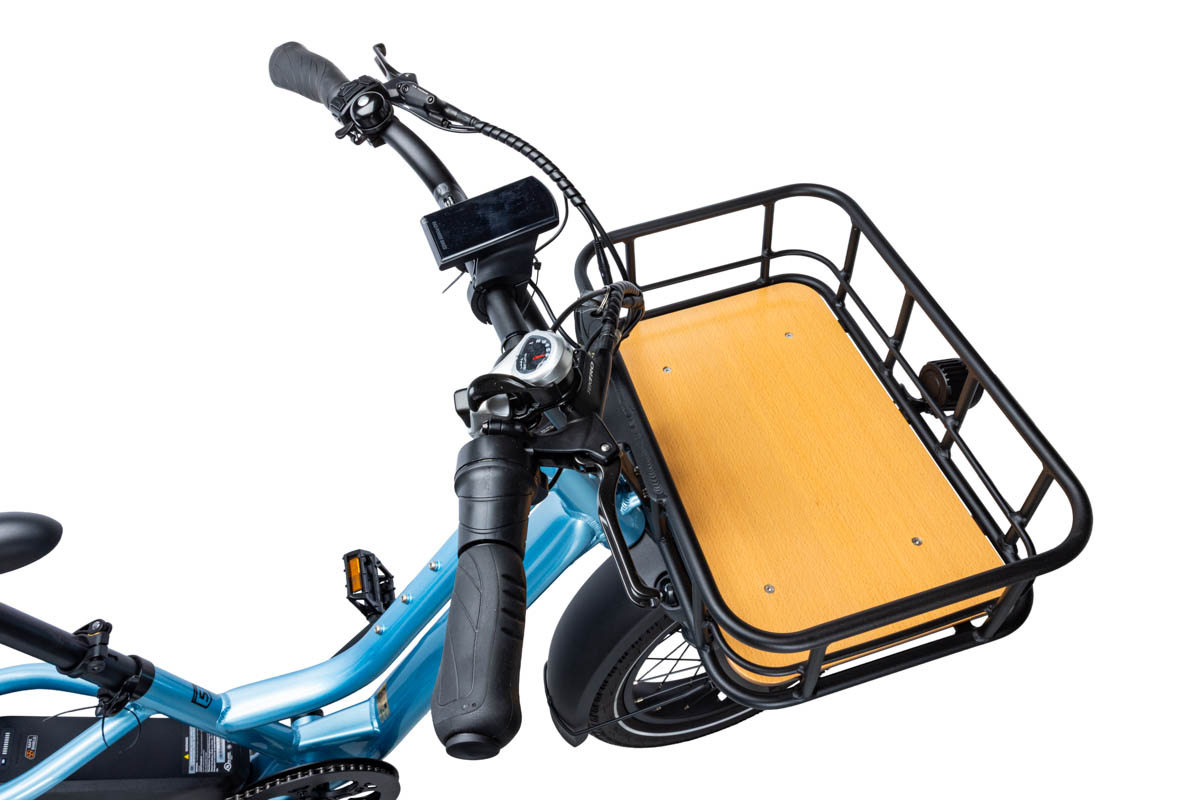 An overhead view of a basket on a blue bike