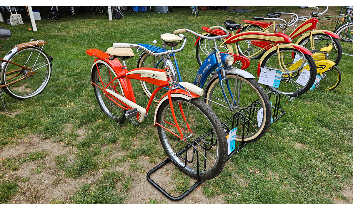 Bicycles, like this orange 1955 Evans Sonic Scout, added non-motorized charm to Motor Muster. / Image by Matt Anderson 