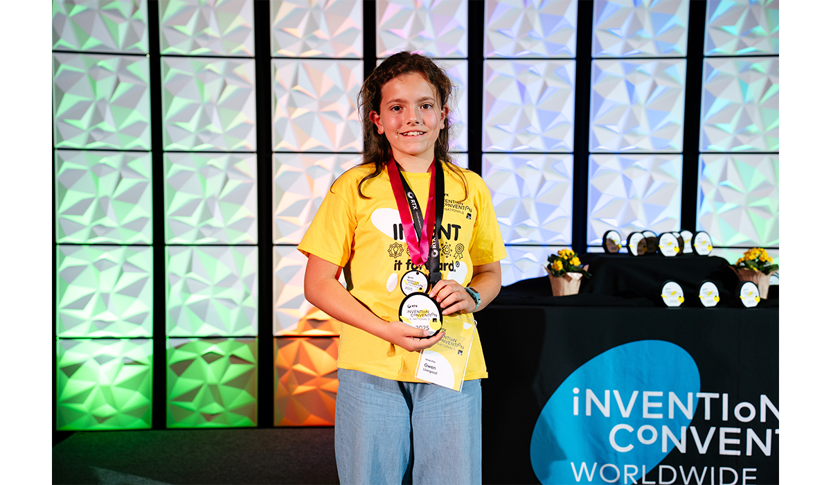 Gwen Livingood accepts the Environment and Sustainability Award, presented by the Avangrid Foundation, for her invention Incredapack. Photo by Nick Hagen.
