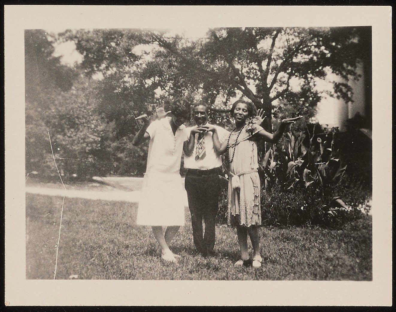 Hughes (center) and Hurston (right) pose with an unidentified friend in Tuskegee, Alabama in 1927