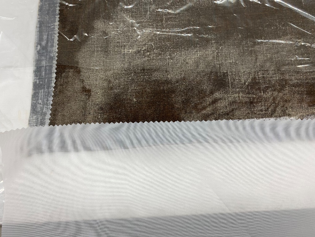 Corner showing several layers of fabric