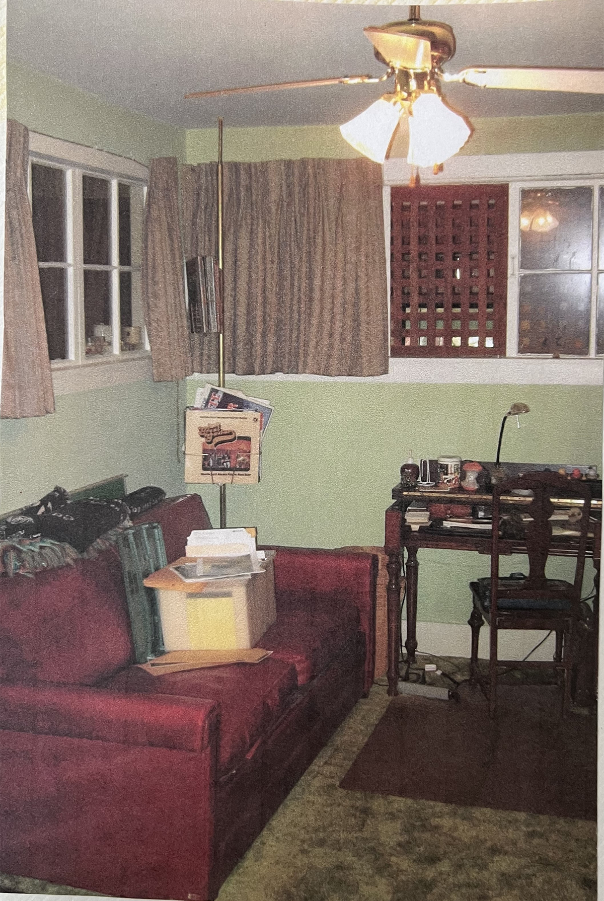 The album holder appears in this photo of the Jackson Home music room, taken about 1990.