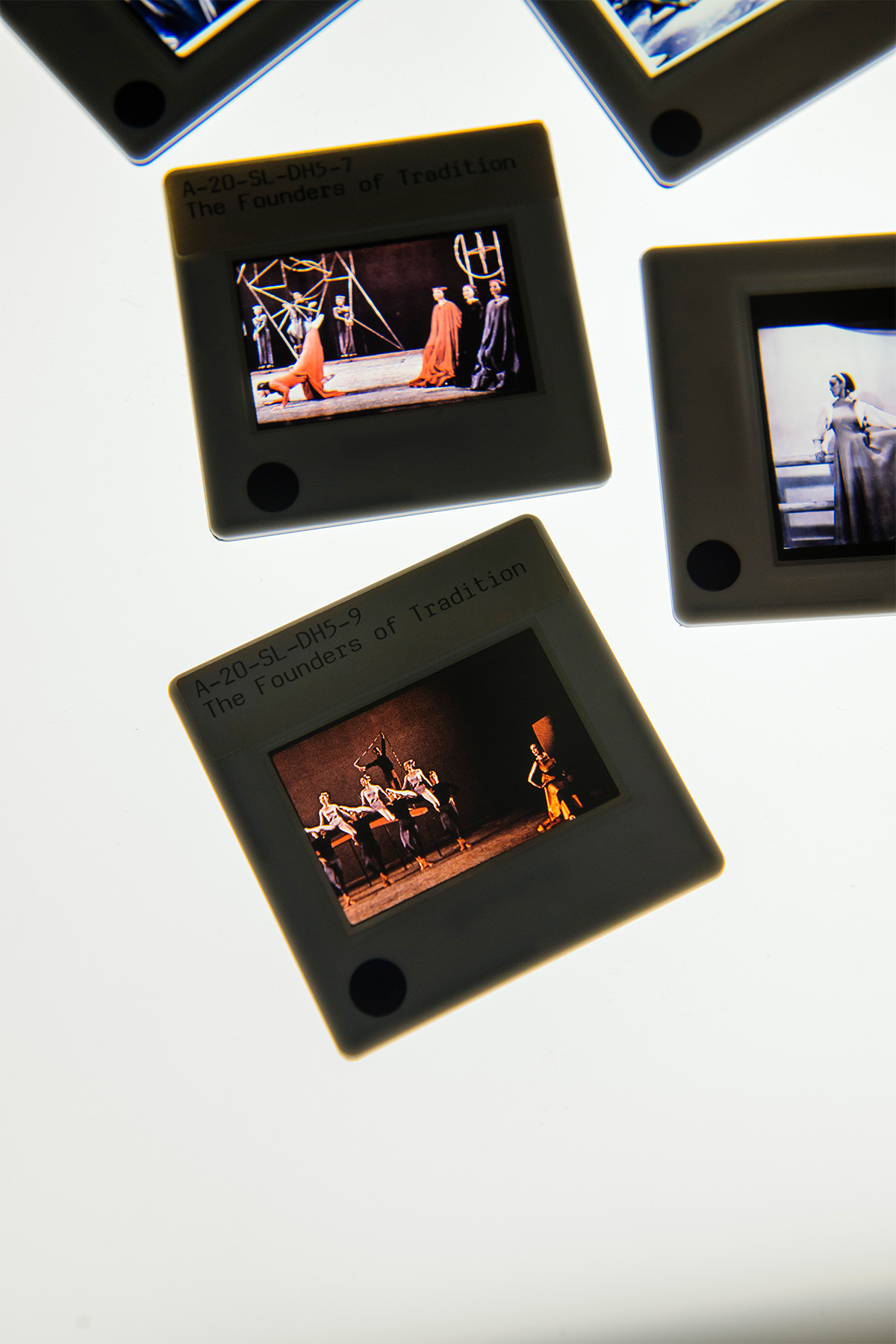 Slide  images from performances of (clockwise from bottom) Acrobats of God (1960), Seraphic Dialogue (1955) and Frontier (1935). PHOTO BY EE BERGER