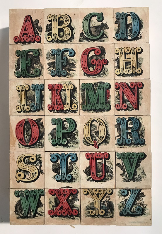 Set of blocks arranged together to display the alphabet in elaborate letters