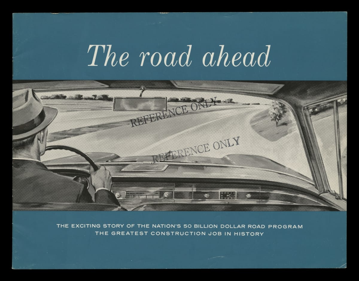 Page with text and blue bars at top and bottom; black-and-white drawing showing the back of a person driving a car on a freeway (as if the viewer was in the backseat)