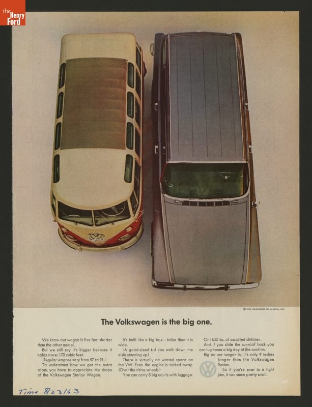 Magazine advertisement page with aerial image of two vans and text at the bottom