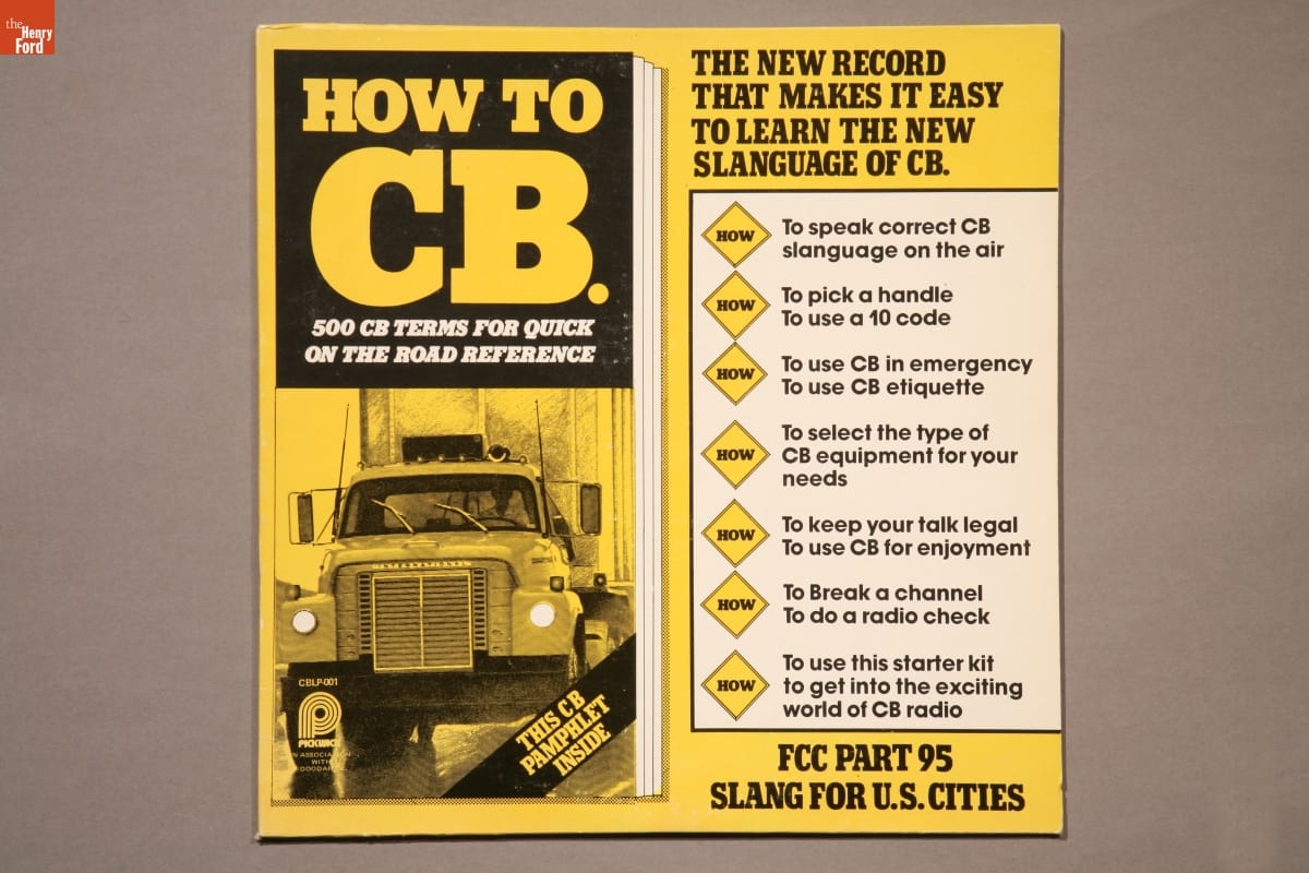 Yellow record cover with text and image of front of large truck