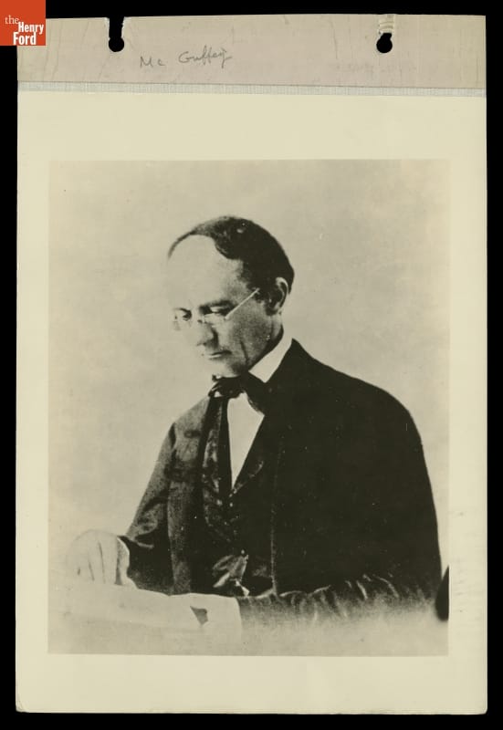 Portrait of Educator William Holmes McGuffey Reading a Book, circa 1860 Photograph of man wearing glasses and a suit reading a book