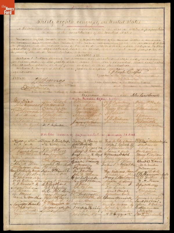 Page with handwritten text and many signatures at the bottom