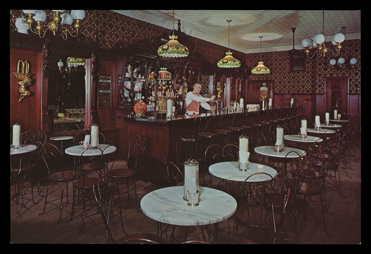 Eurich's Ice Cream Parlor, Dearborn, Michigan, circa 1962 Elaborately decorated Victorian-style ice cream parlor with small marble tables and wire chairs