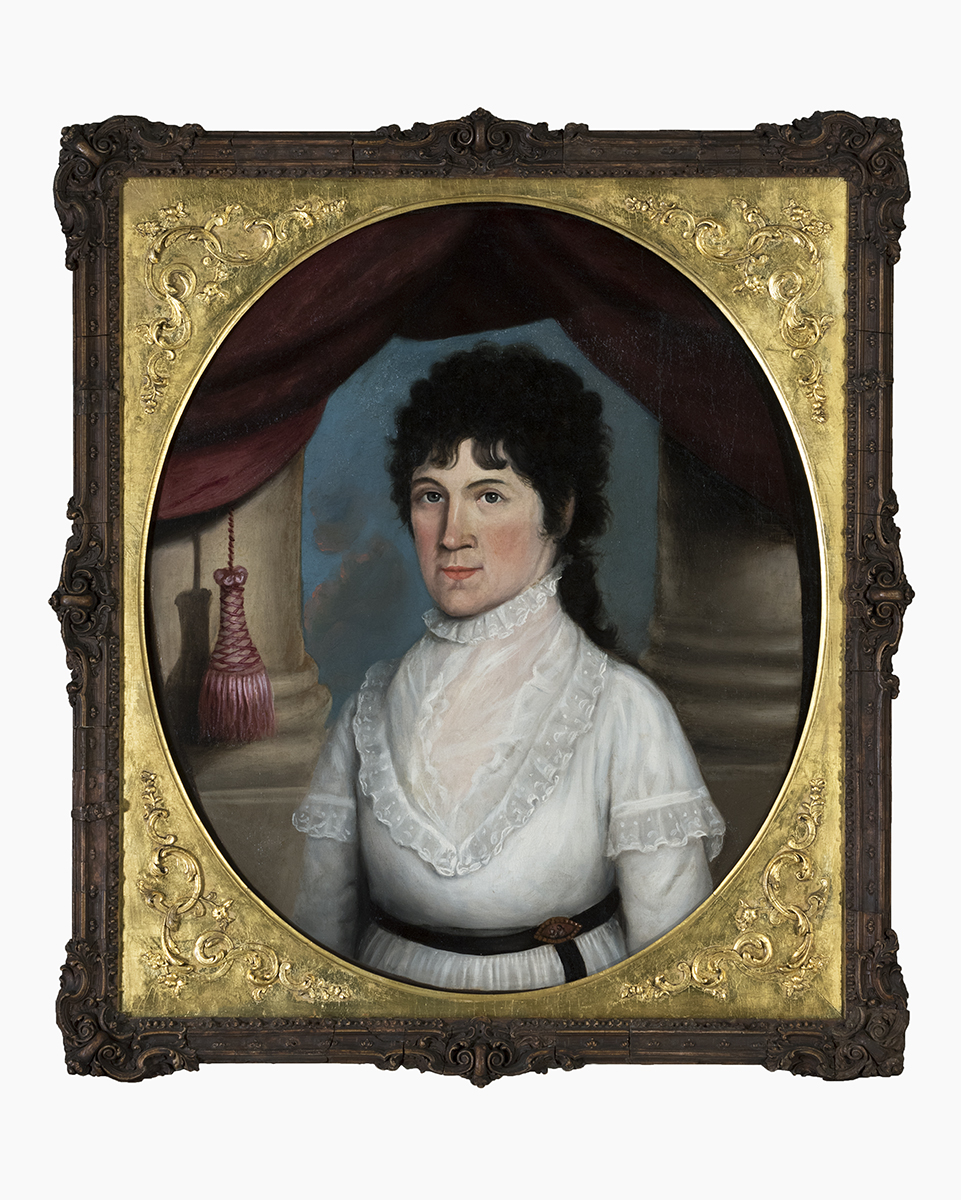 Portrait of Eliza Webster Jones, 1823-1850 Oval painting in elaborate gold and dark frame of woman in white dress with dark curly hair standing between two large columns