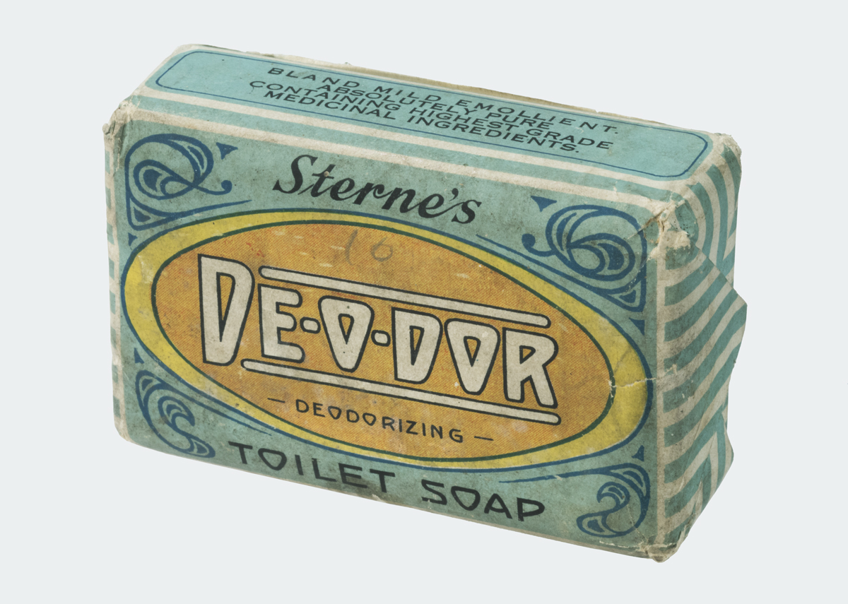 Sterne's Deodorizing Toilet Soap, 1900-1915 Bar of soap wrapped in blue paper with decorative blue elements and yellow-orange oval and text