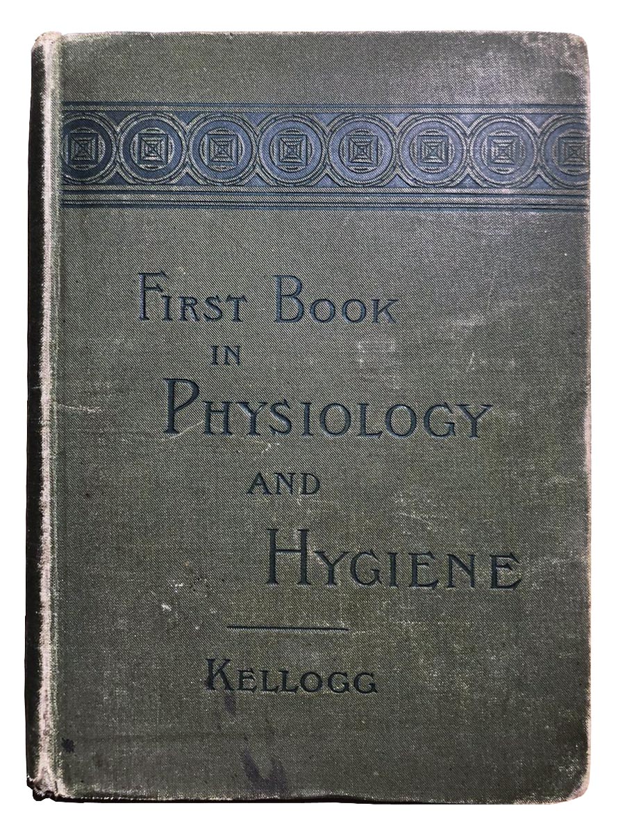 Drab green cover of Dr. J.H. Kellogg textbook, First Book in Physiology and Hygiene embossed with black circular design at top