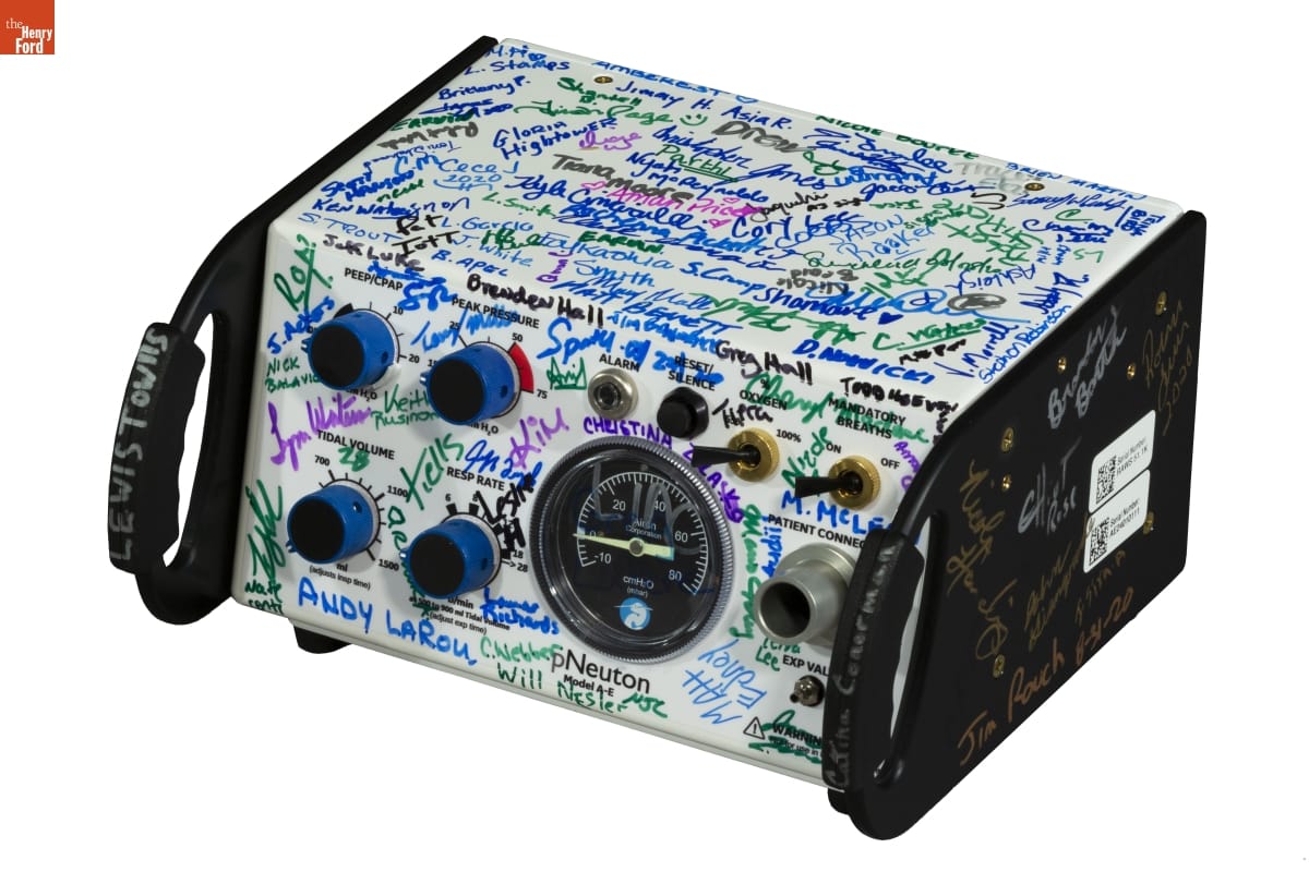 pNeutron Model A-E Pneumatic Ventilator, Signed by Rawsonville Components Plant Employees, 2020 Black-and-white equipment with dials, switches, and gauges, covered in signatures in various colors
