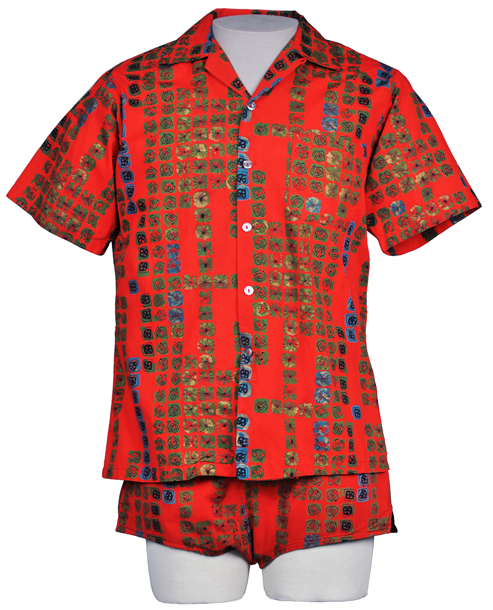 Red shirt and shorts featuring blue and green squares filled with various patterns