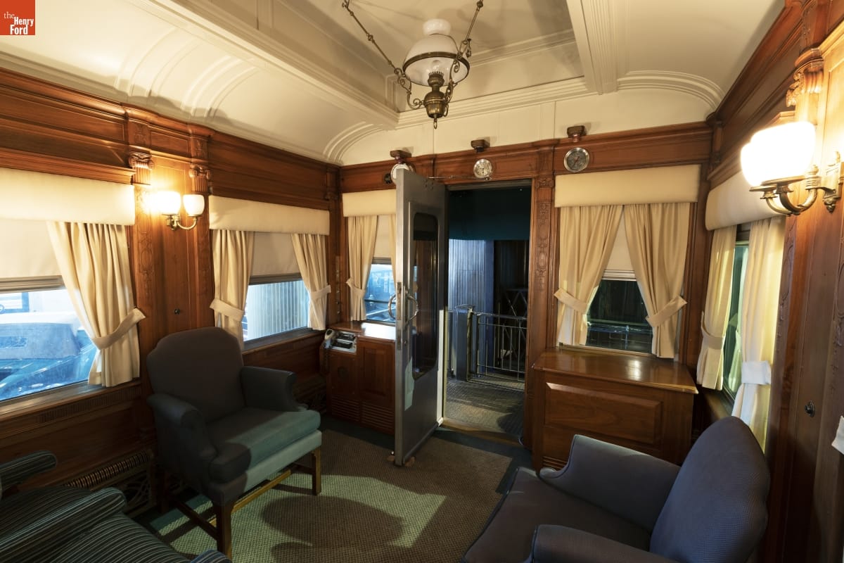 Interior View of Henry Ford's Private Railroad Car "Fair Lane," 1921 Rail car interior containing chairs, doors, windows, and arched ceiling