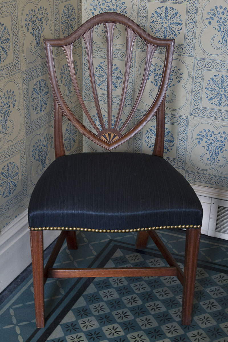 Noah Webster Home / chair Wooden chair with back slats in shield shape and dark blue satin seat