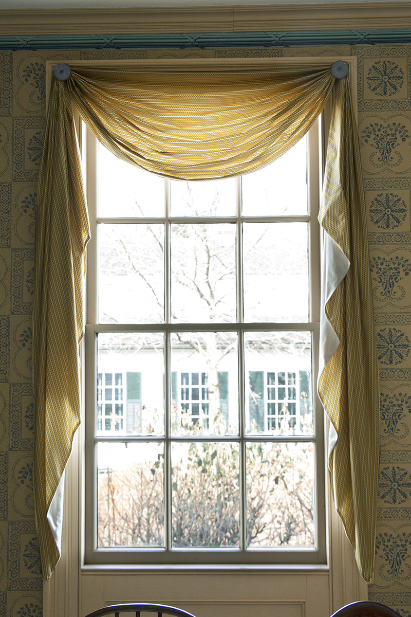Noah Webster Home / window Window with curtains surrounded by wallpapered wall
