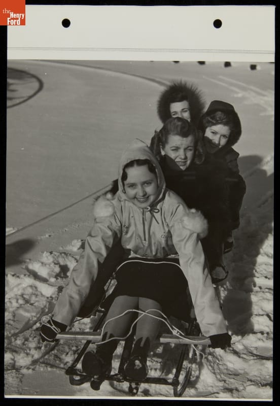Women Sledding on Snow on "The Road of Tomorrow," Ford Exposition, New York World's Fair, 1940 Four women in a sled on a bed of snow