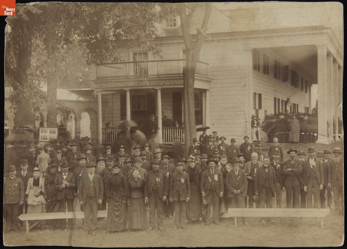 Members of the Grand Army of the Republic (G.A.R.) Visiting Mount Vernon, September 21, 1892 Large group of men and women posed in front of a large wooden building