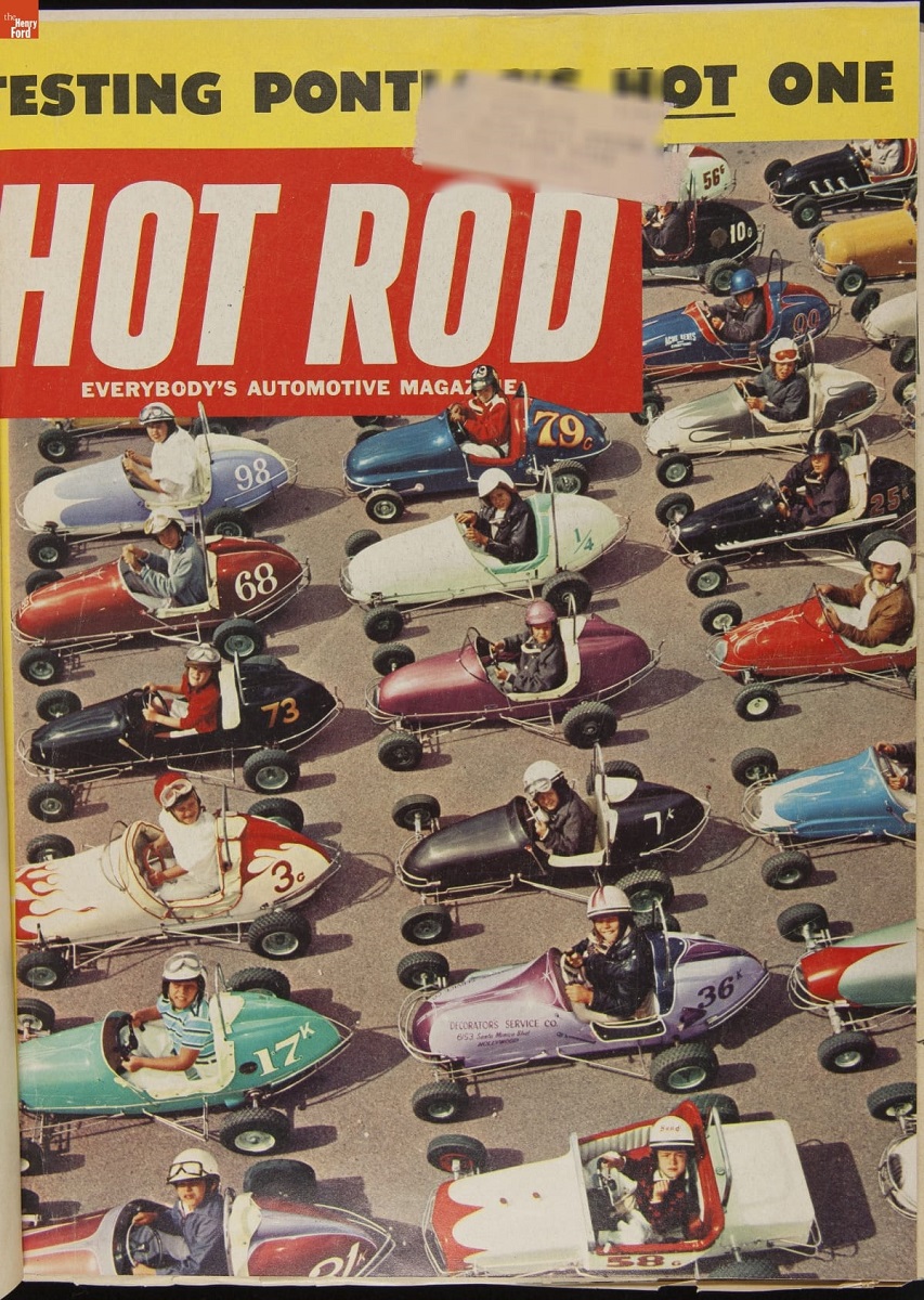 Bound Volume of "Hot Rod" Magazine for 1958 / page1, redacted Magazine cover containing text and aerial photo of boys wearing helmets sitting in small open cockpit cars