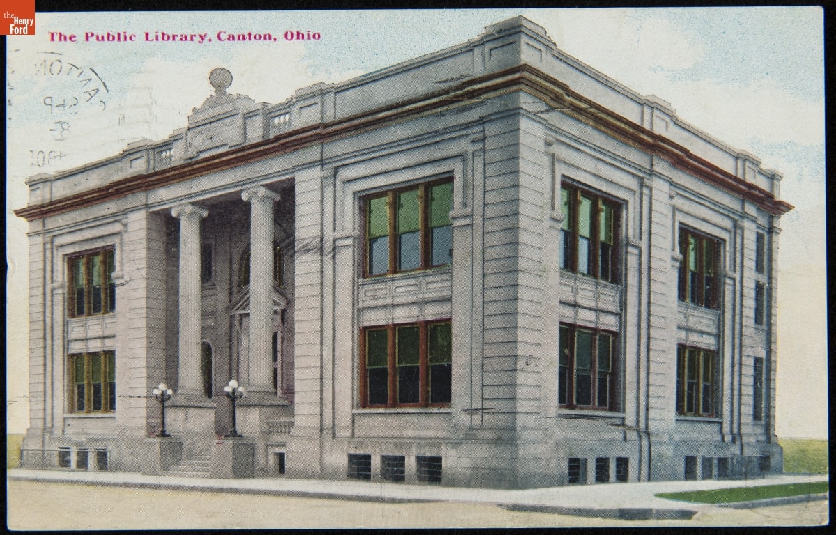 Postcard depicting the front street view of the public library in Canton, Ohio in 1909