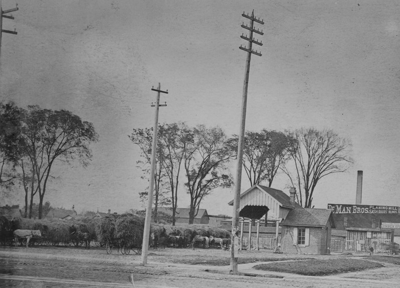 THF623857 Hay market with scales, likely located at Trumbull and Cherry Streets, Detroit, 1880-1890.