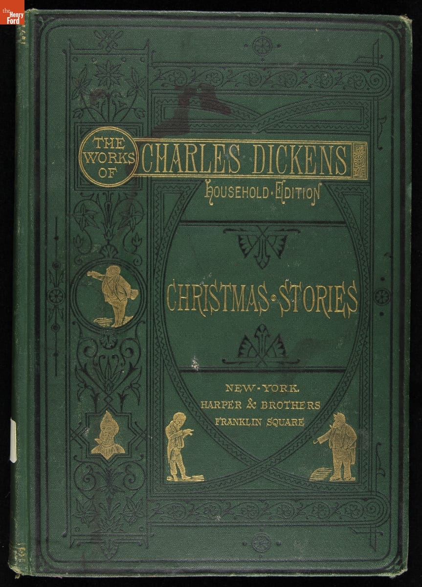 Christmas Stories, 1876 Green book cover with gold text and illustrations and black decorative elements