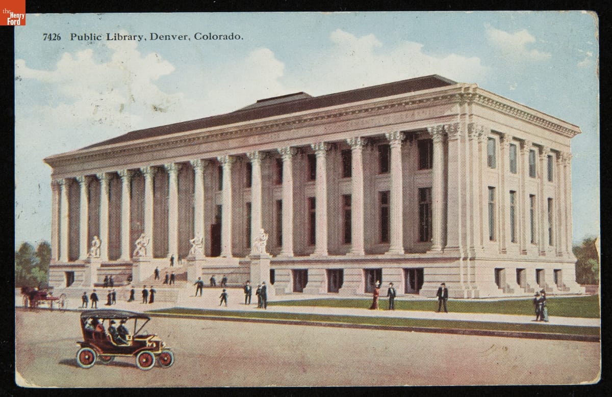 Postcard depicting the front street view of the public library in Denver, Colorado in 1910