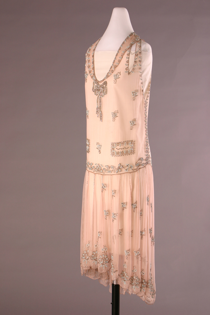 Evening Dress, Worn by Elizabeth Parke Firestone, 1928-1929 Peach-colored shift dress with beaded detailing