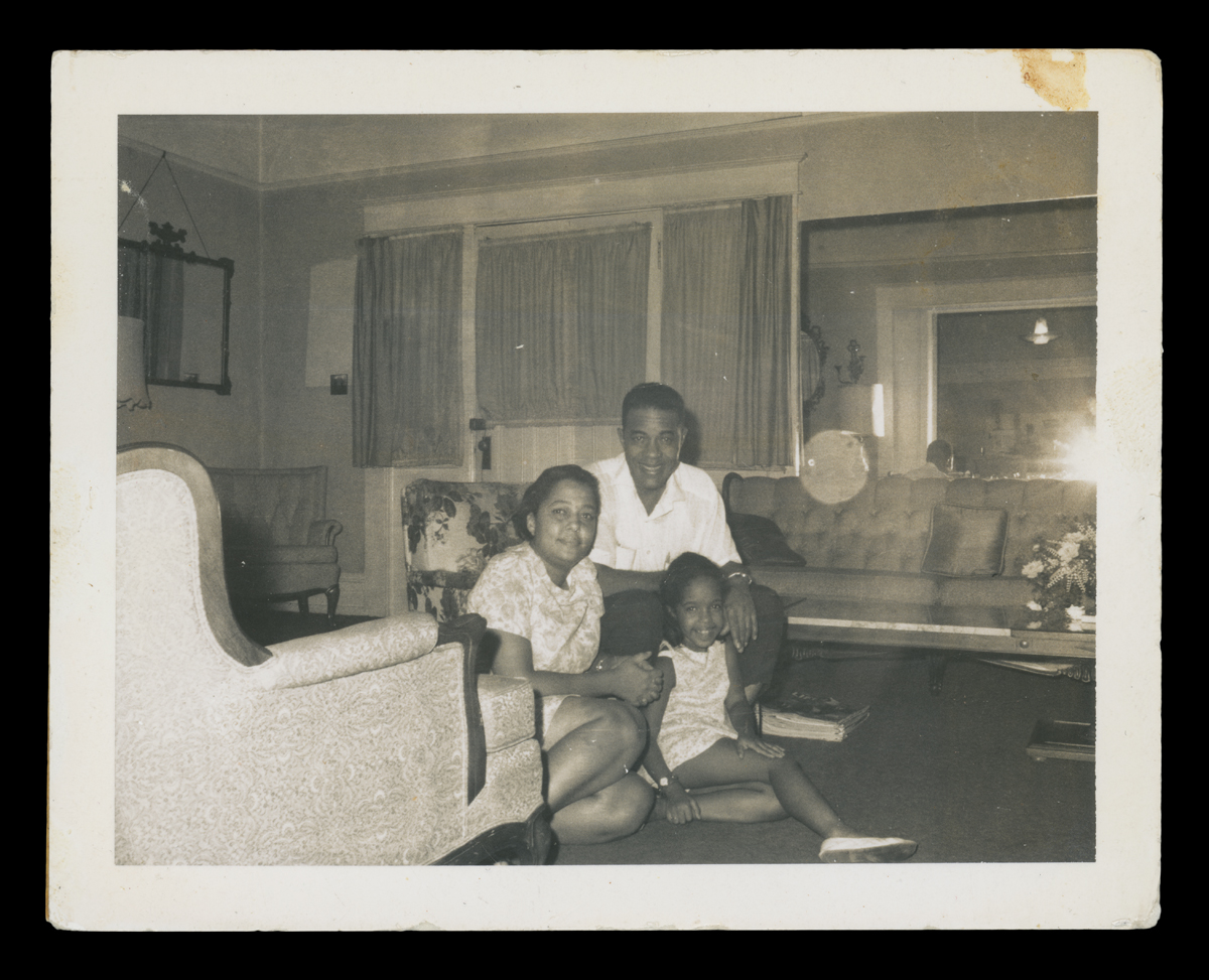 Richie Jean, Dr. Sullivan, and Juwana Jackson in the living of their home