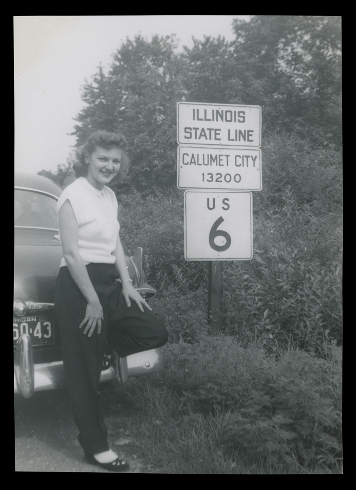 Velma Truant at the Illinois state line during her honeymoon, about 1950