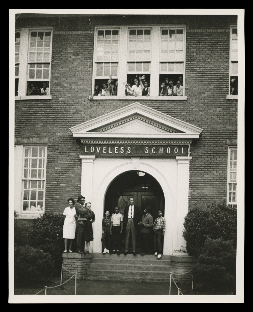 THF731415 Students and adults from Montgomery's Loveless School watch voting rights marchers from Selma arrive in Montgomery, Alabama, on March 25, 1965.