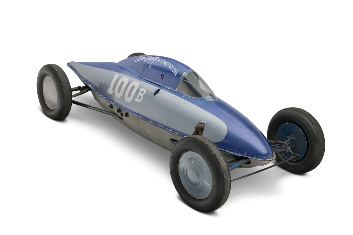 Tear-shaped race car in two shades of blue