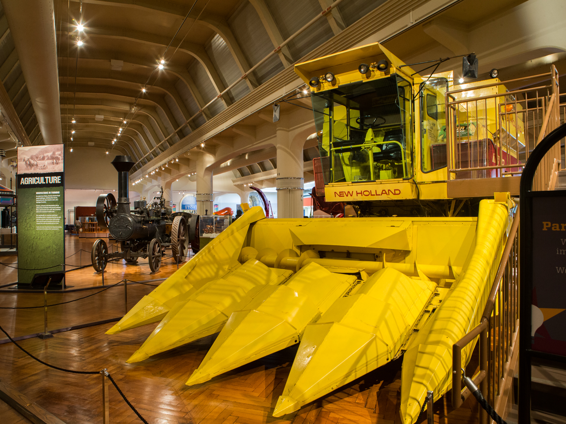 New Holland Combine on the floor of Henry Ford Museum of American Innovation